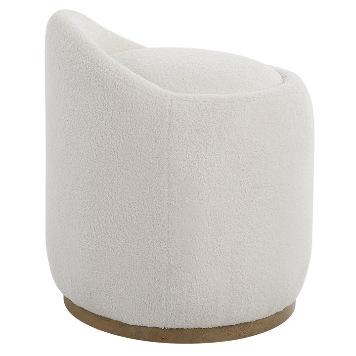 Uttermost Swirl Swivel Sheepskin Ottoman