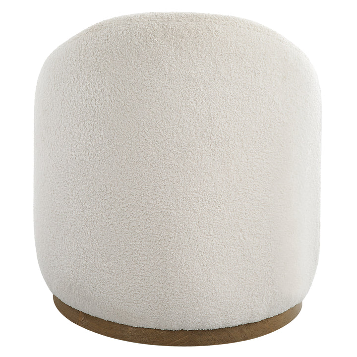 Uttermost Swirl Swivel Sheepskin Ottoman